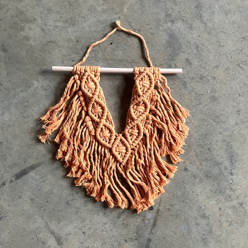 Golden yellow macramé wall hanging
